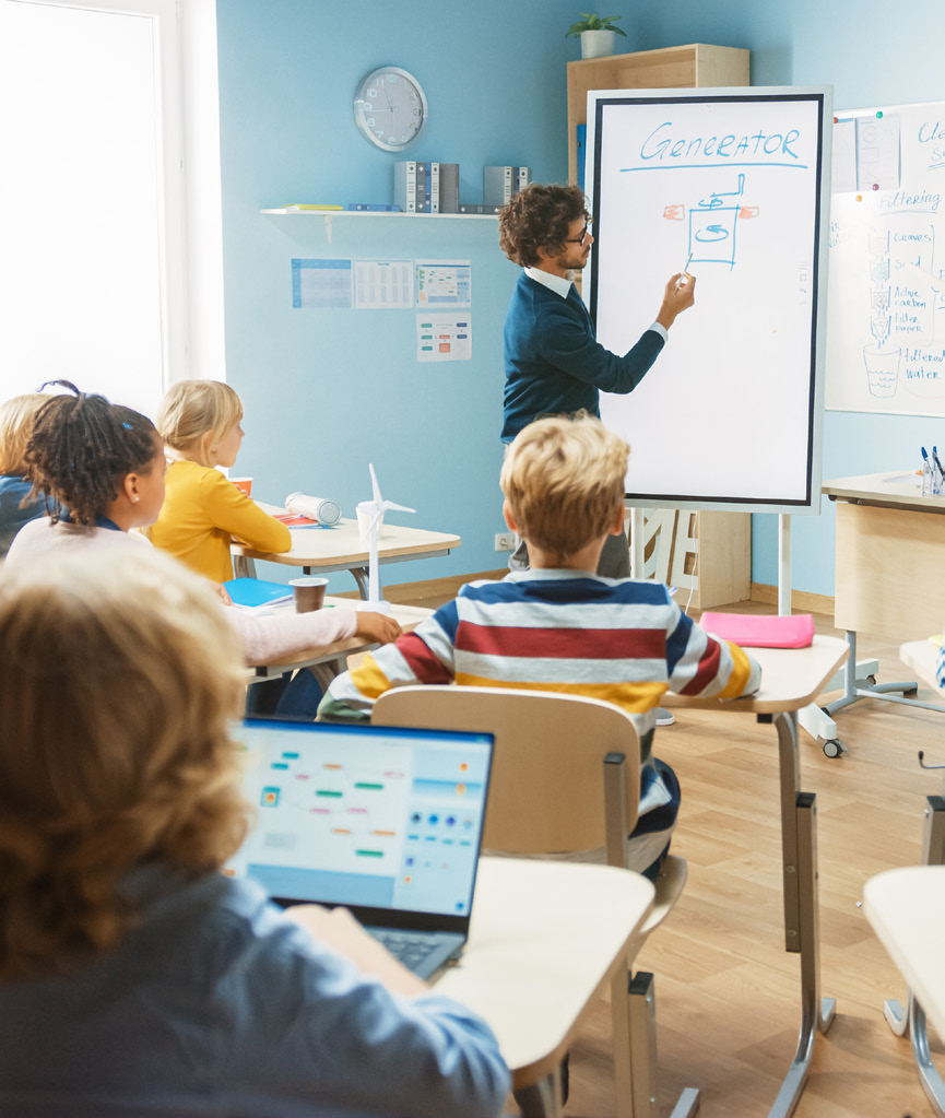 Child wearing spectacles in a classroom setting